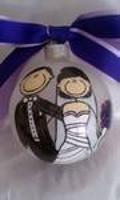 Wedding ornament personalized to look like the bride and groom.  
