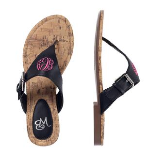 Brown or Black monogrammed sandals.